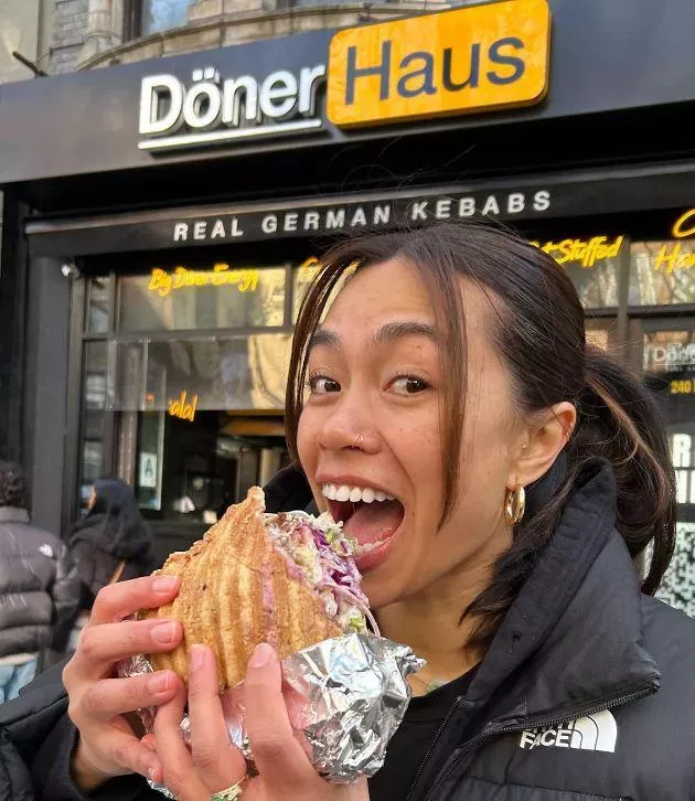 Eating a pide döner standing outside the shop