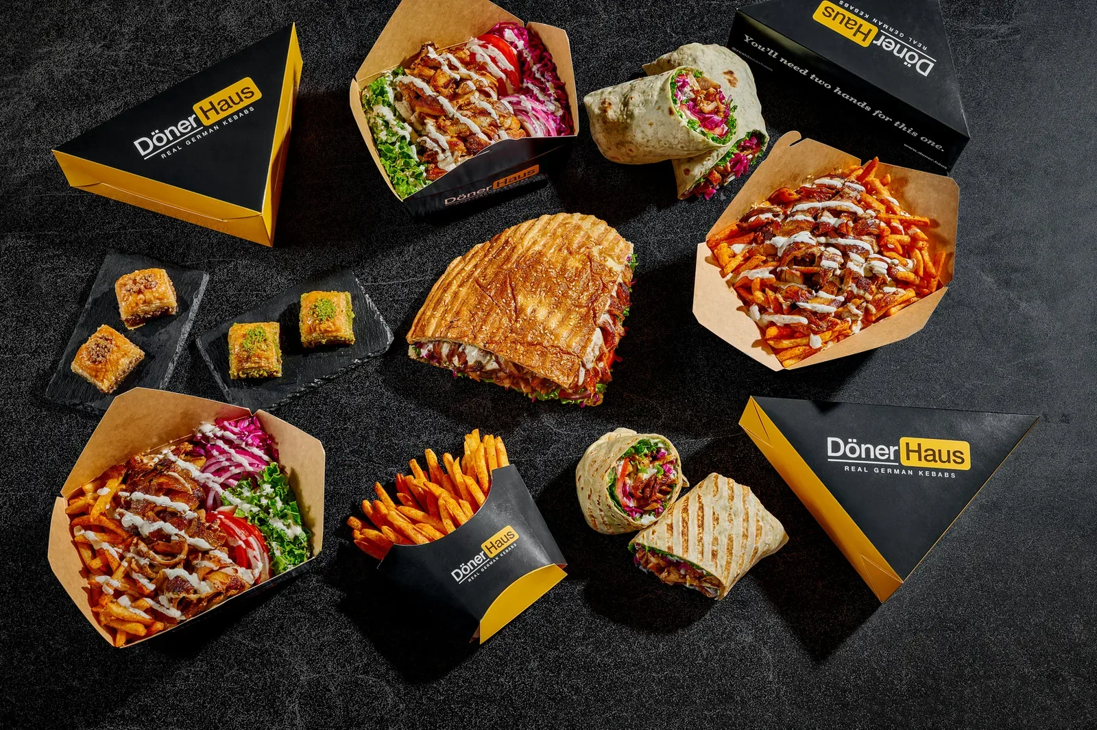 Boxes, sandwiches and fries laid out together